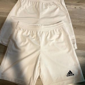 Two pair white adidas sports shorts. Kids size small